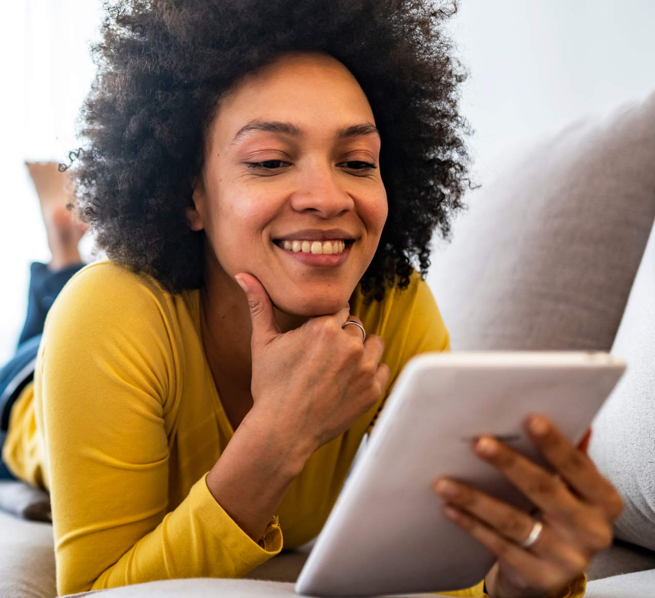 woman holding tablet